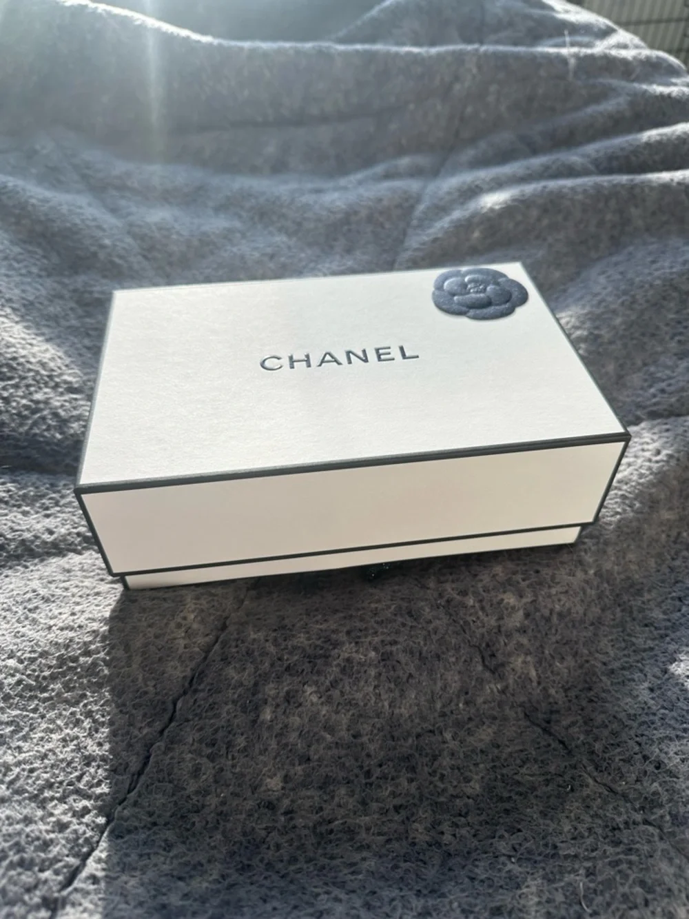 CHANEL White Box with Black Camellia Accent